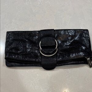 Hobo Black leather Clutch with Silver Ring Accent